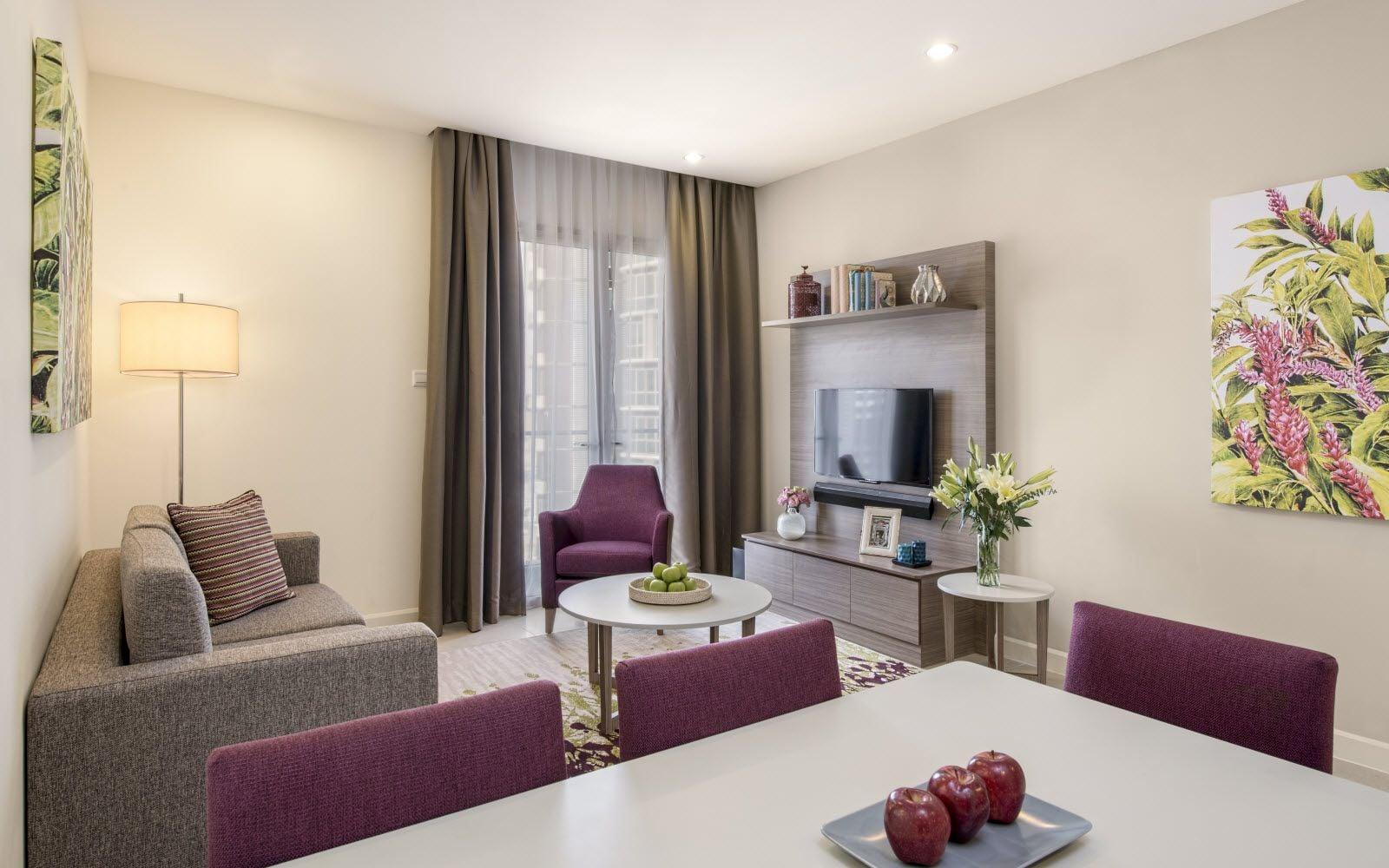 Guests in a Somerset serviced residence living room